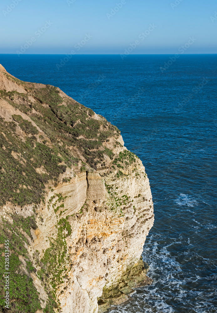 Chalk cliffs in sea costal landscape scene