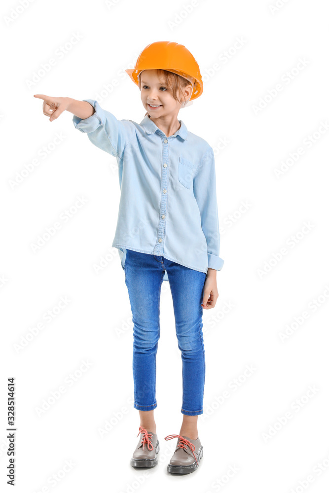 Cute little architect pointing at something on white background Cute little architect pointing at something on white background
