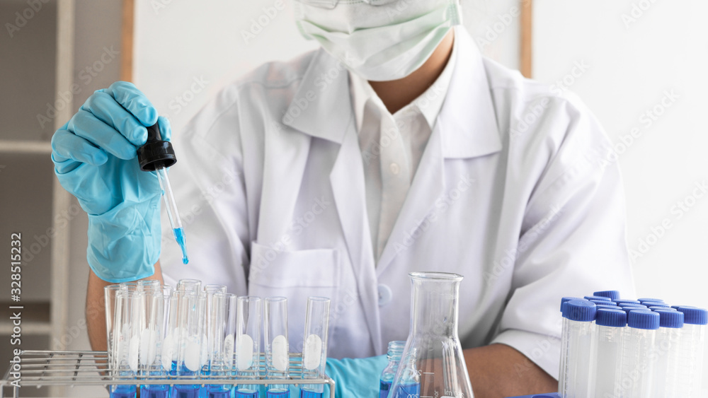 Female scientist are experimenting in the laboratory. Female scientist are experimenting in the laboratory.