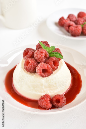 Panna cotta with fresh raspberries