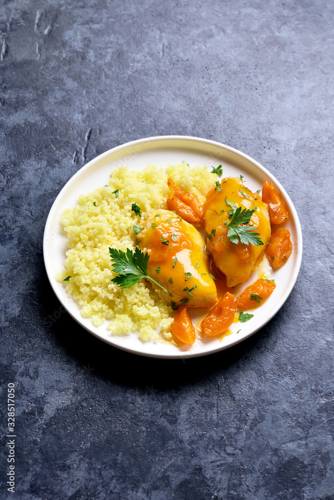 Chicken breasts in apricot sauce and couscous