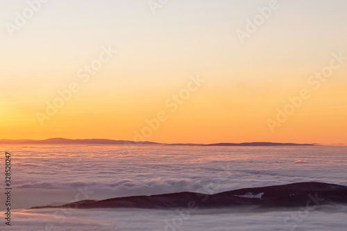 view to sunrise with inversion from the higest mountain of Czech Republic- Snezka.