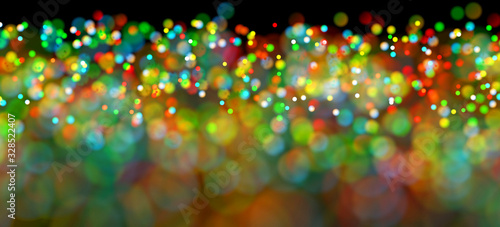 Abstract bokeh lights soft blinking colorful background.