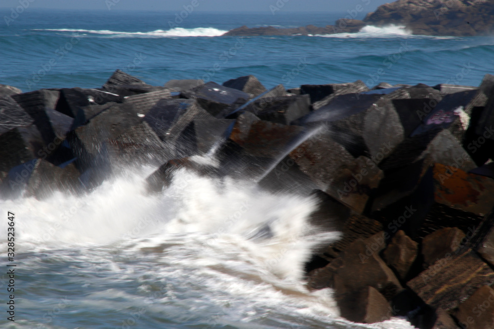 Waves hitting the shore in San Sebastian