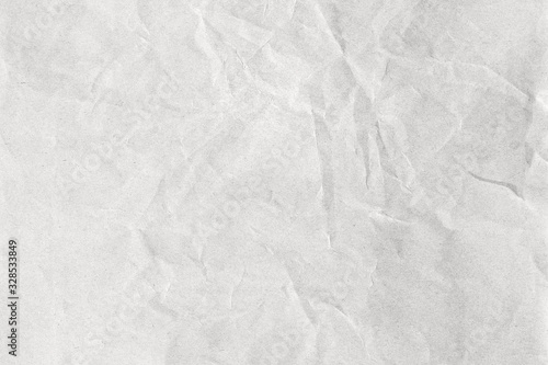 Grey crumpled background paper texture