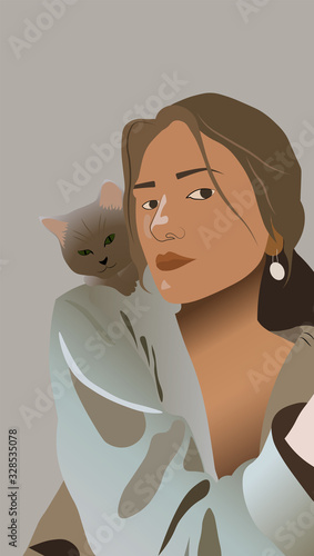 Young girl playing with a little cat. Wearing a shirt