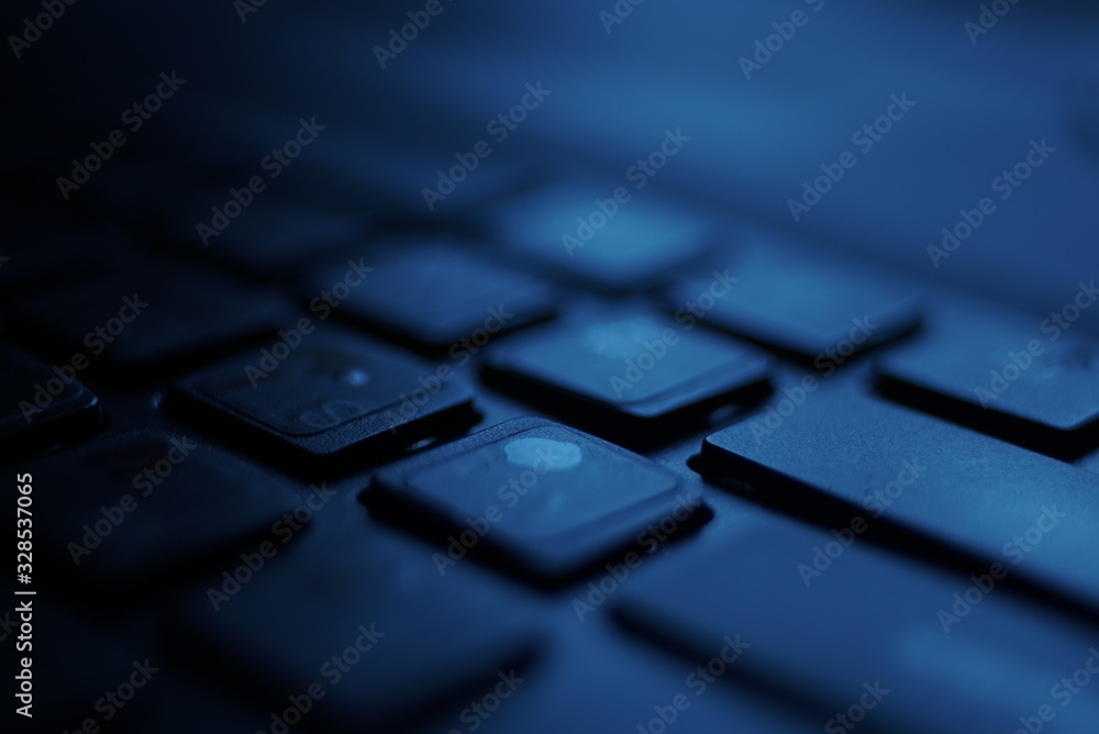 Laptop Keyboard As A Background Toned To Blue Close Up Laptop Keyboard As A Background Toned To Blue Close Up