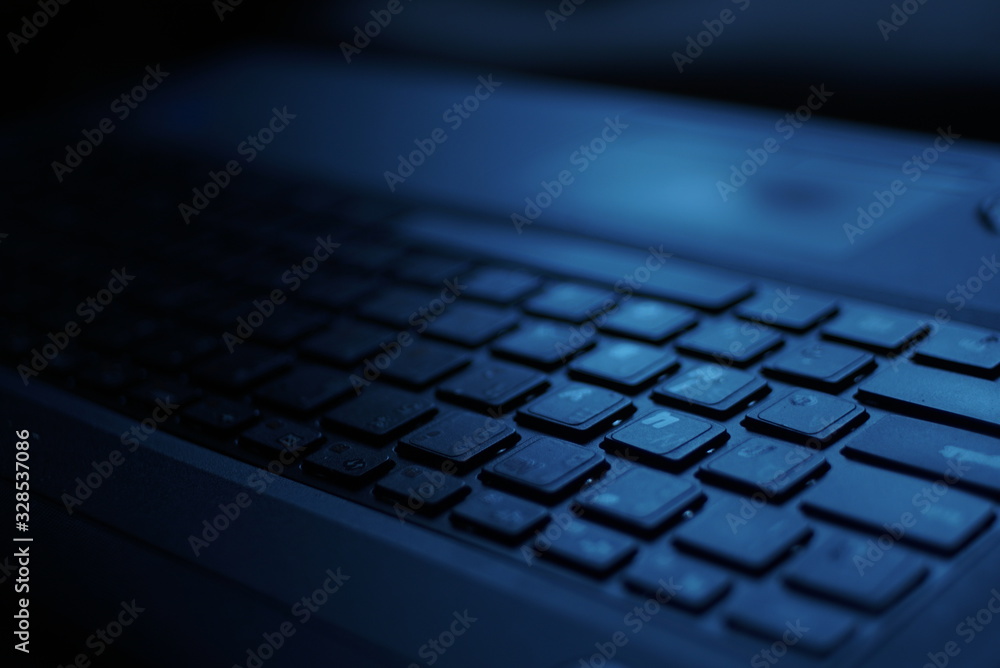 Laptop Keyboard As A Background Toned To Blue Close Up Laptop Keyboard As A Background Toned To Blue Close Up
