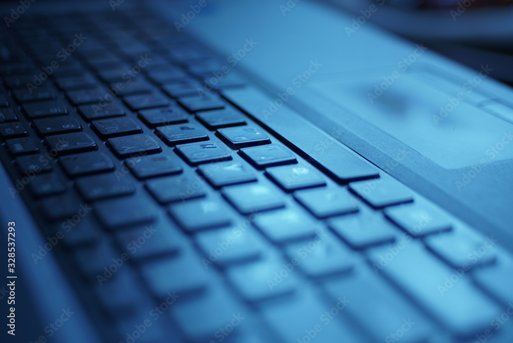 Laptop Keyboard As A Background Toned To Blue Laptop Keyboard As A Background Toned To Blue
