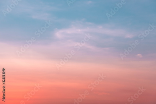 Sky gradient from blue to pink sunset © phungatanee
