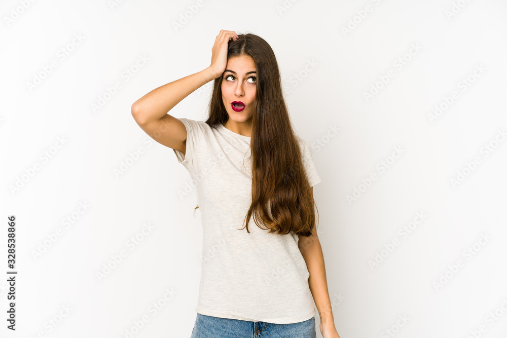 Young caucasian woman isolated on white background being shocked, she has remembered important meeting. Young caucasian woman isolated on white background being shocked, she has remembered important meeting.