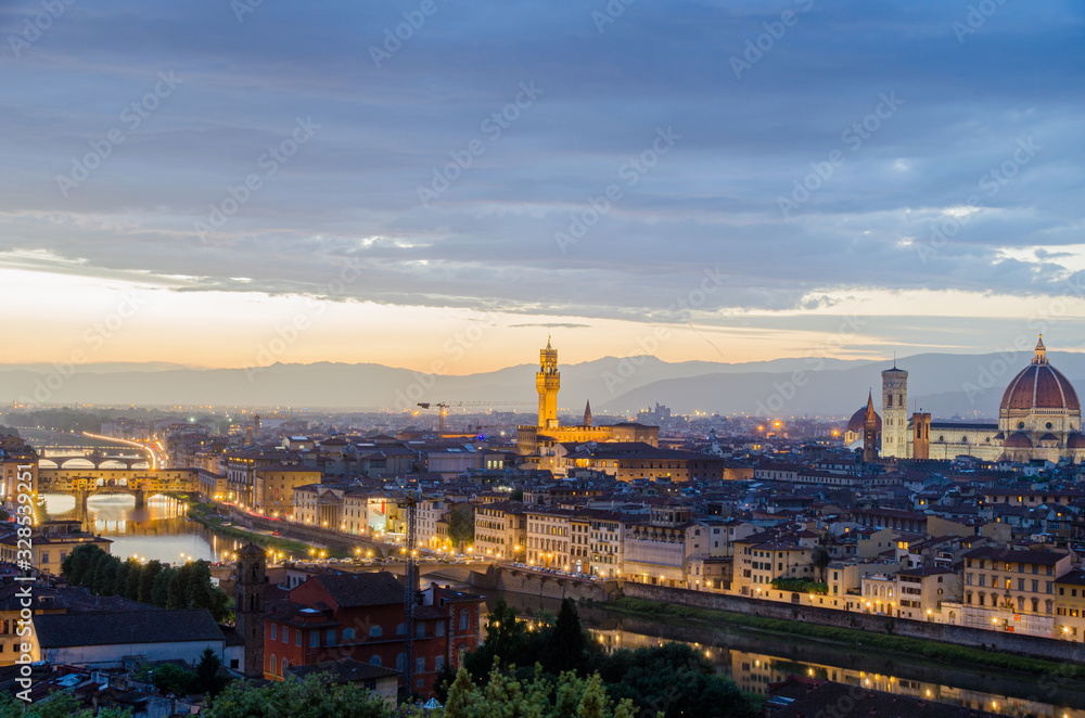 Amazing view of Florence during sunset with Palazzo Vecchio tower in the background in Florence Italy