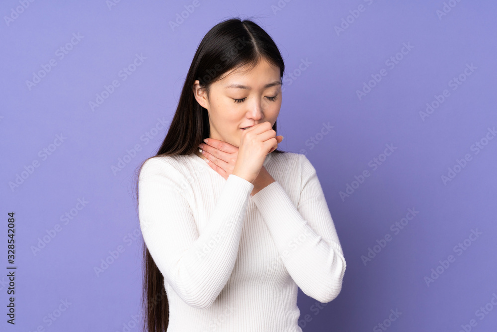 Young asian woman isolated on purple background coughing a lot Young asian woman isolated on purple background coughing a lot
