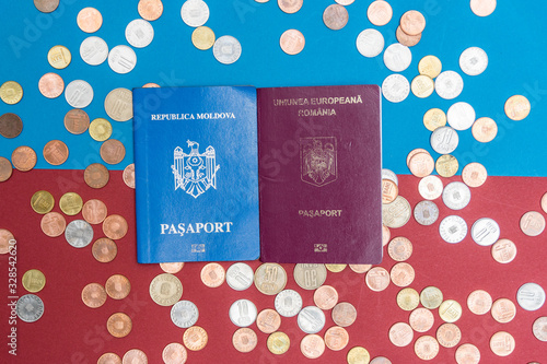 Dual citizenship concept. The Romanian and Moldovan passport. Coloseup of Romanian and Moldovan passport. Multiple citizenships, dual citizenship, multiple nationalities or dual nationality concept photo