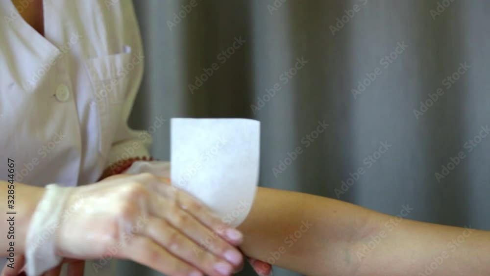 Removing unnecessary hair on the legs. Procedure sugaring in a beauty salon. Sugar depilation. Depilatory sugar paste Removing unnecessary hair on the legs. Procedure sugaring in a beauty salon. Sugar depilation. Depilatory sugar paste