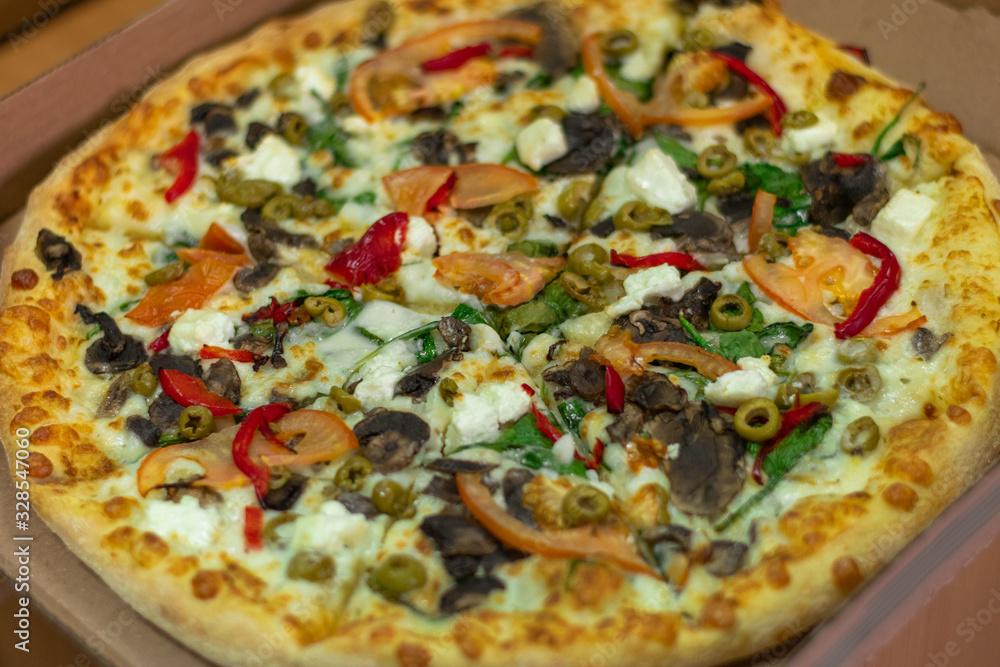 Tasty pizza with cheese and vegetables Tasty pizza with cheese and vegetables