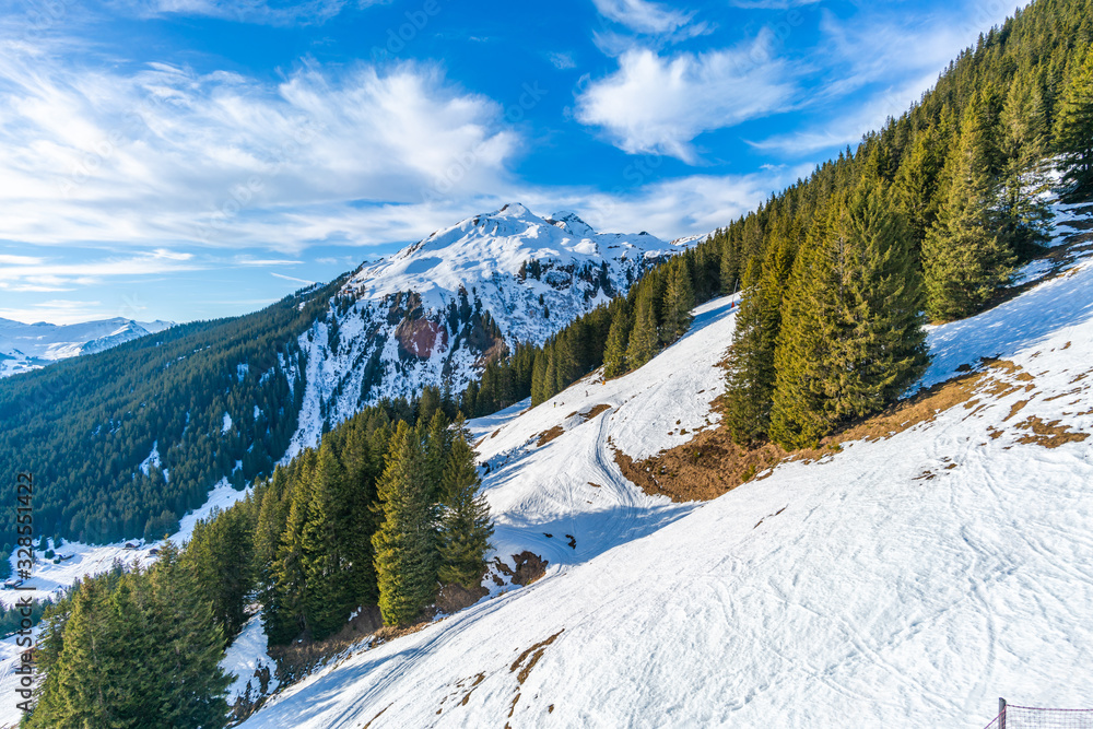Winter landscape on the First mountain in Swiss Alps in Grindelwald ski resort, Switzerland