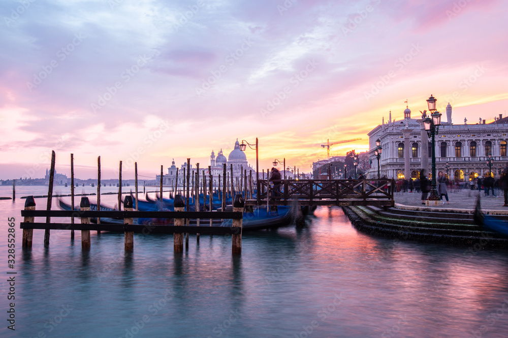 Fototapeta premium gondola in a river of Venice at sunset