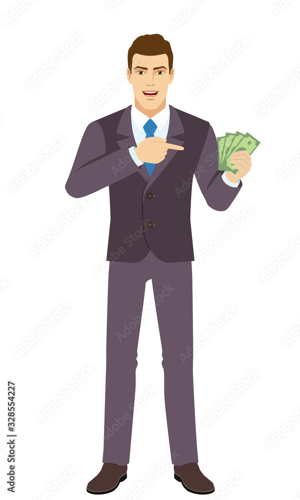 Smiling Businessman pointing at money in his hand. Full length portrait of Businessman in a flat style. Smiling Businessman pointing at money in his hand. Full length portrait of Businessman in a flat style.