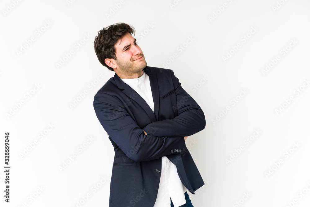 Young business man isolated on white background dreaming of achieving goals and purposes Young business man isolated on white background dreaming of achieving goals and purposes