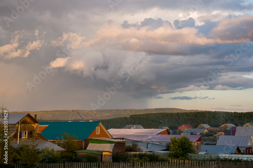 Dark blue grey sky with much rainy clouds before storm.  Background of heaven. Beautiful evening
