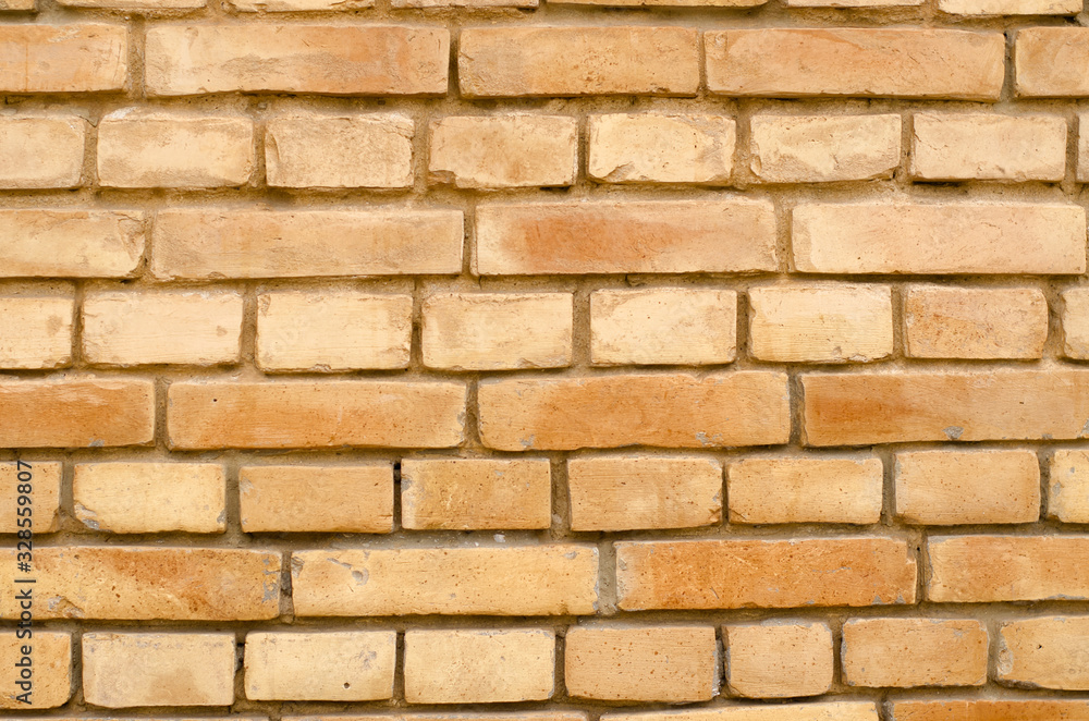 Wall of an old orange brick. Background with space for your text. Wall of an old orange brick. Background with space for your text.