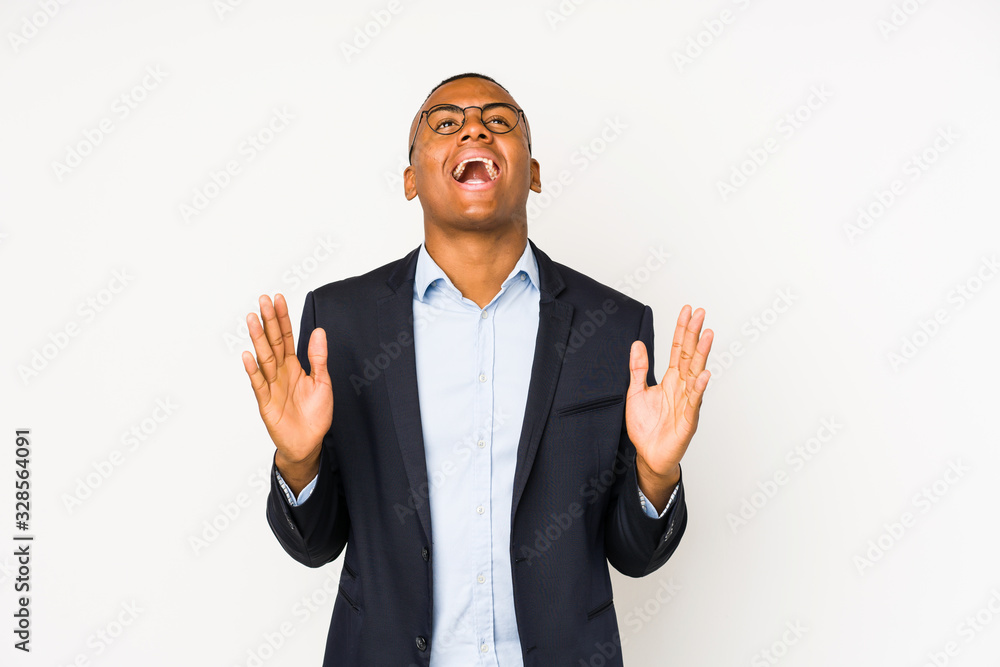 Young business latin man isolated on white background joyful laughing a lot. Happiness concept. Young business latin man isolated on white background joyful laughing a lot. Happiness concept.