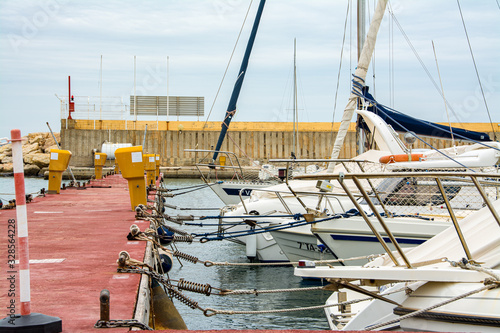 Boat in Comarruga harbor, Tarragona, Catalonia, Spain.