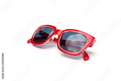 Red sunglasses frame isolated on a white background photo