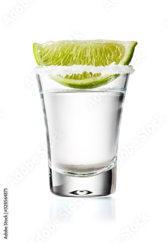 Tequila Glass Shot With Lime Slice and Salty Rim, Isolated on White Background