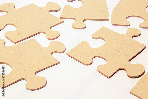 paper puzzles on a white background