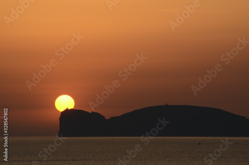 sunset at capo caccia, alghero, sardinia, italy