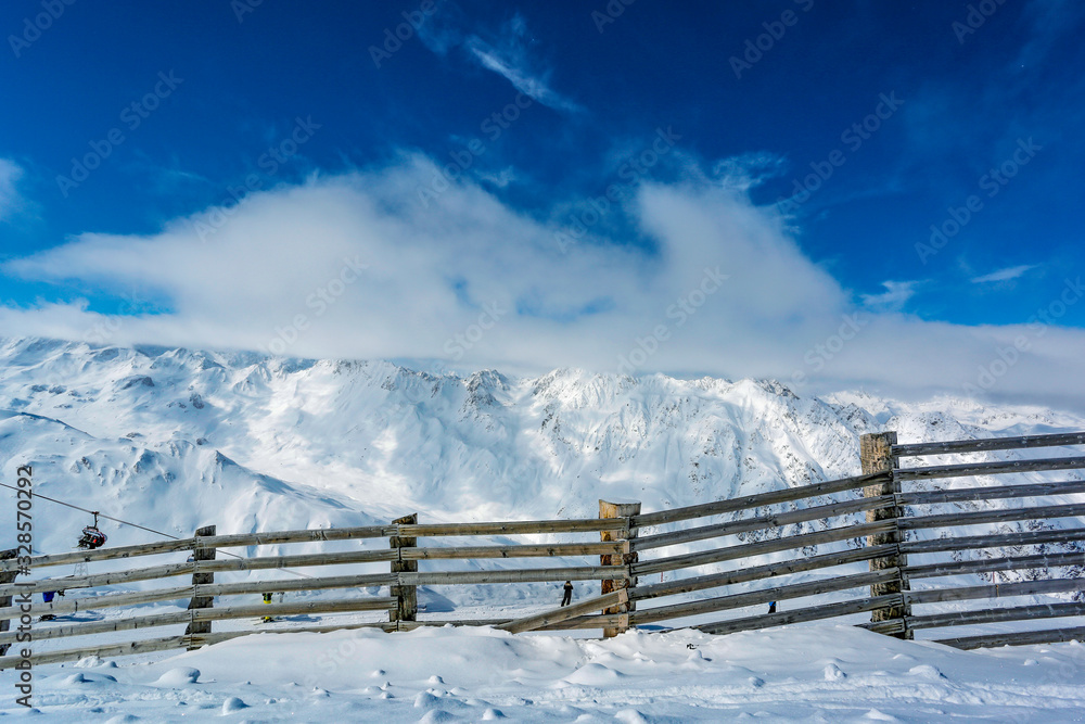 Landscape of snowy mountains in the Austrian Tyrol in the middle of a beautiful winter Landscape of snowy mountains in the Austrian Tyrol in the middle of a beautiful winter