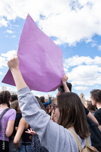 Woman fighting in a feminist demonstration for woman's day in Valencia.