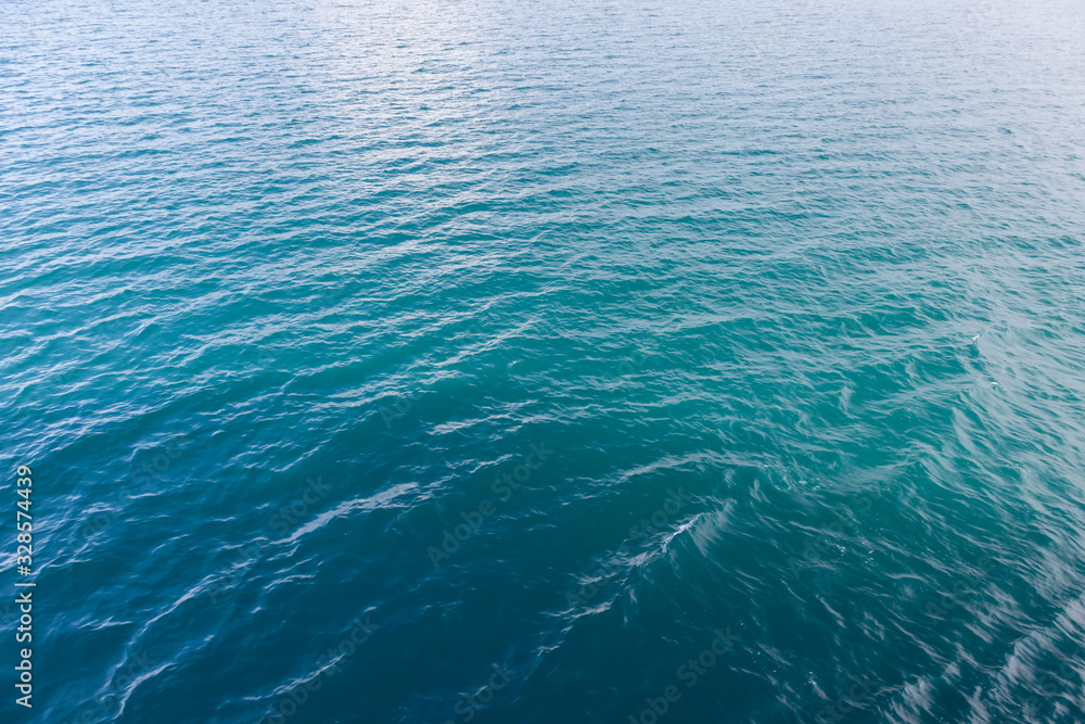 The texture of the turquoise sea surface The texture of the turquoise sea surface
