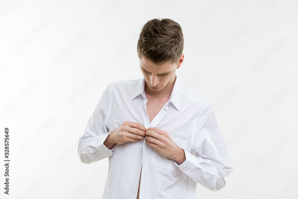 Portrait of young attractive man on white background Portrait of young attractive man on white background