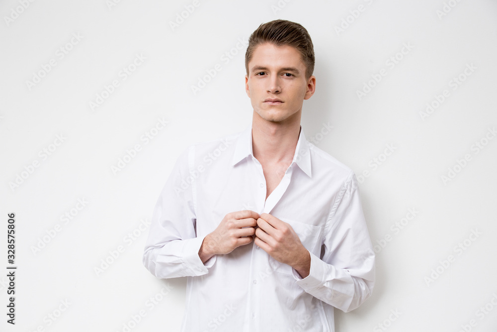 Portrait of young attractive man on white background Portrait of young attractive man on white background