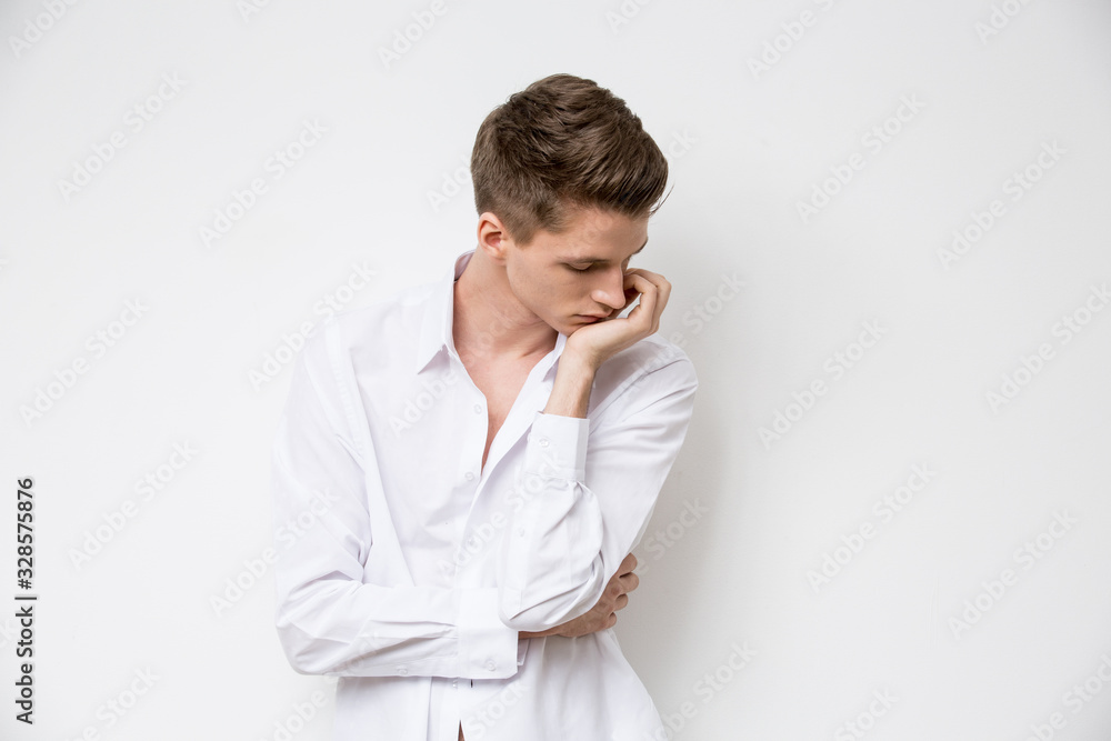 Portrait of young attractive man on white background Portrait of young attractive man on white background