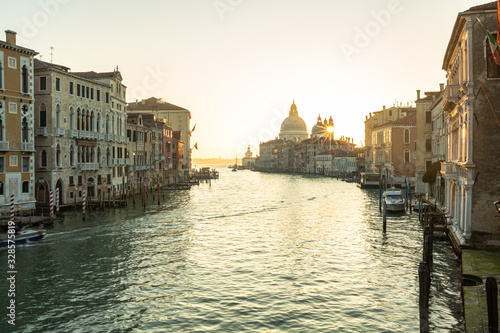 canal in Venice, sunrise over the church