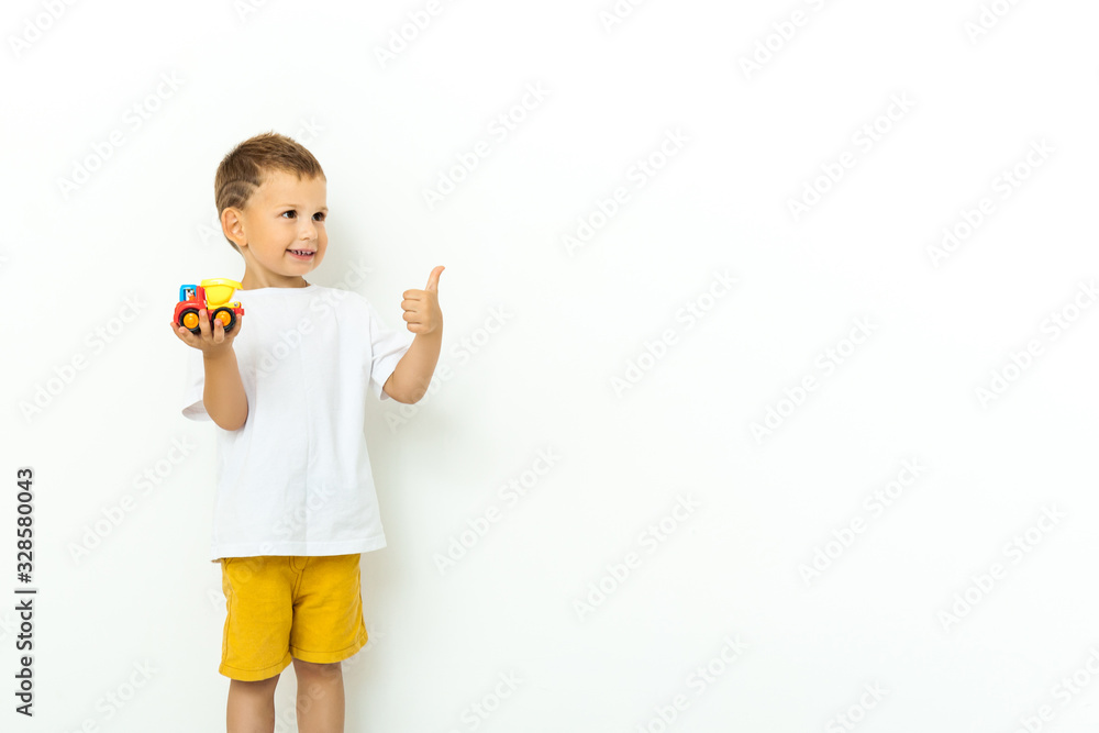Cute little boy playing with a toy Cute little boy playing with a toy