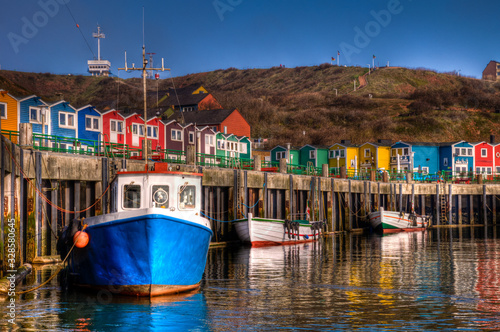 Die bunten Hummerbuden im Hafen von Helgoland photo