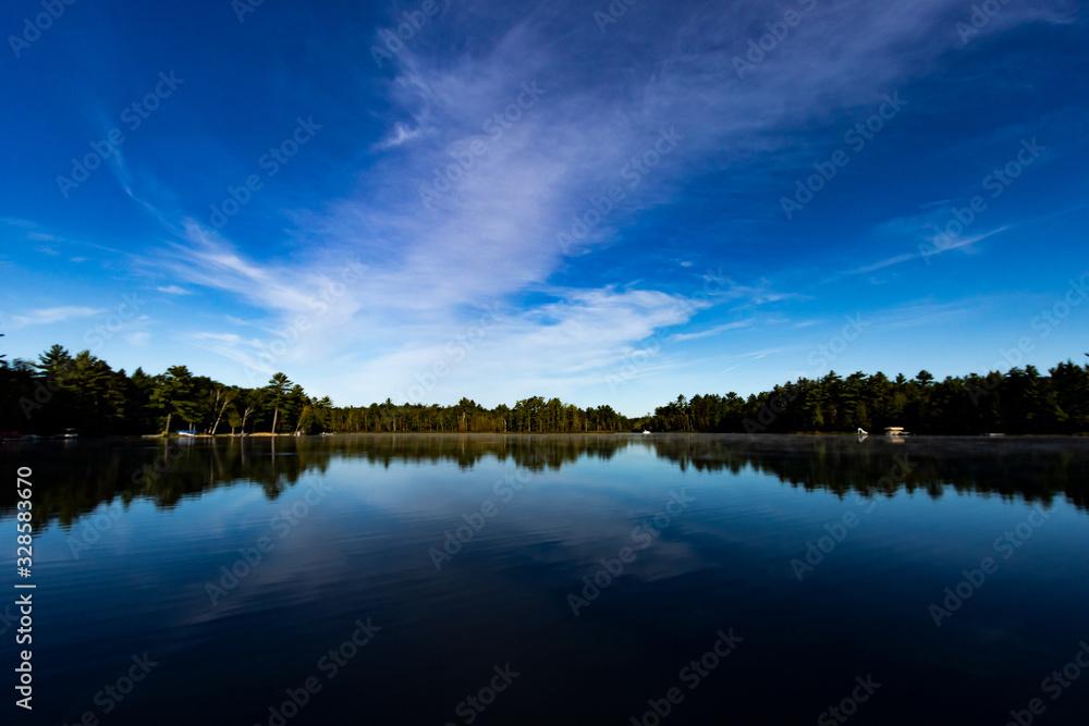 Reflections on Tee Lake in Lewiston Michigan