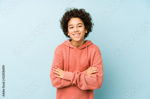 African american little boy isolated laughing and having fun. photo