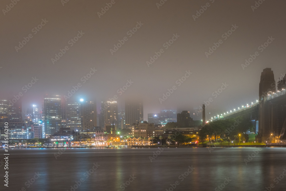 Fototapeta premium sydney downtown skyscrapers in low cloud