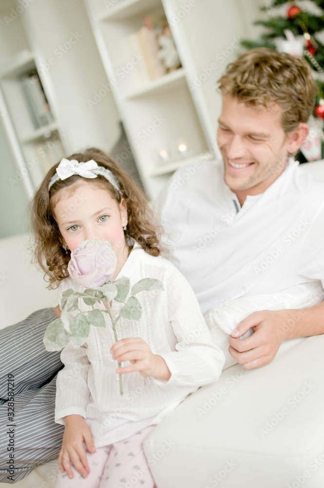Happy father with child enjoying Christmas atmosphere Happy father with child enjoying Christmas atmosphere