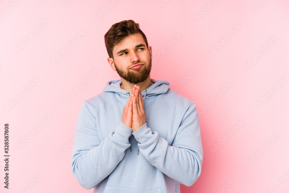 Young caucasian man isolated on pink background making up plan in mind, setting up an idea. Young caucasian man isolated on pink background making up plan in mind, setting up an idea.