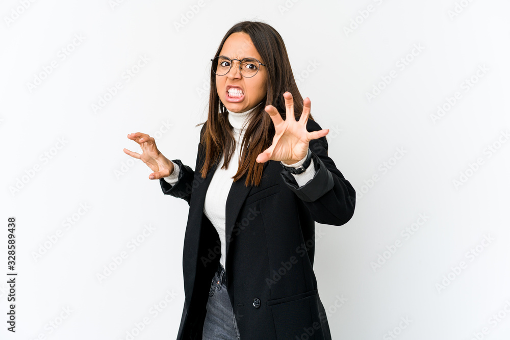Young mixed race business woman isolated on white background upset screaming with tense hands. Young mixed race business woman isolated on white background upset screaming with tense hands.