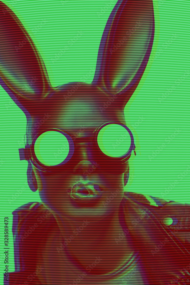 masked easter bunny blowing bubble gum bubbles. Easter party concept