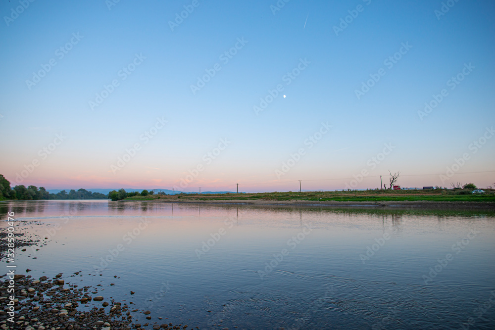 Fototapeta premium Sunrise near the Mures river, Deva