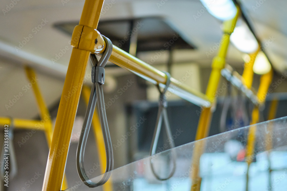 Rubber hinges on metal pipes for safety in public transport.